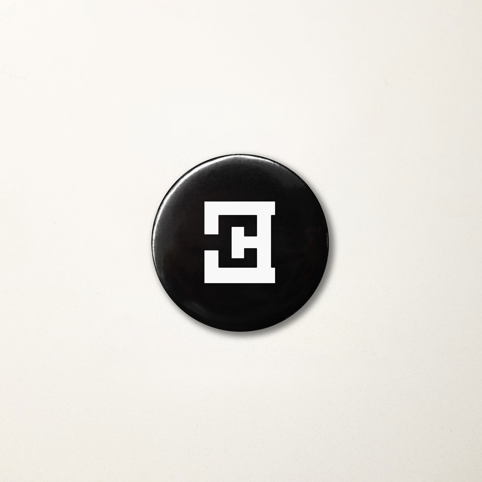 Black pin logo Cappelli Identity Design